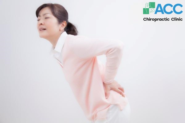 lumbar bone spur causes symptoms