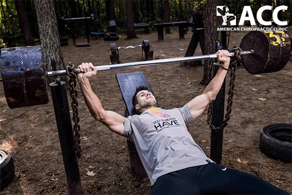 What causes elbow pain during weightlifting?